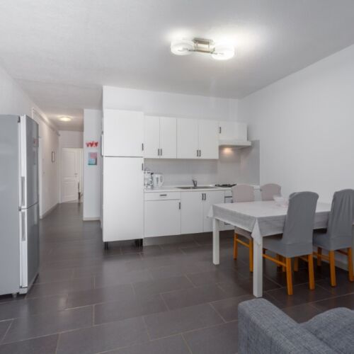 Apartament 4-osobowy na parterze z 2 pomieszczeniami sypialnianymi
