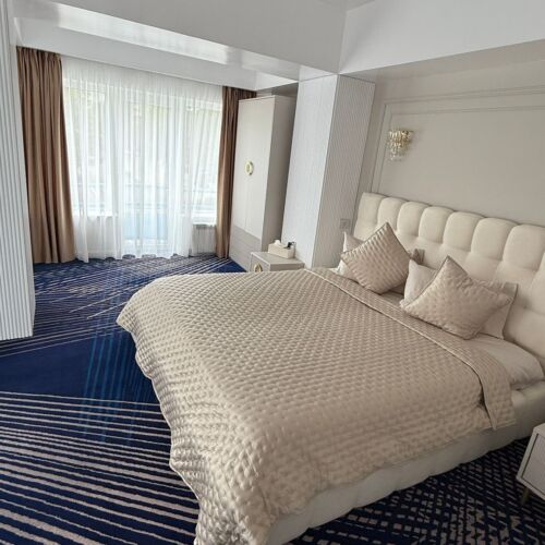 Suita deluxe cu vedere parțială spre mare cu 1 camera pentru 2 pers.