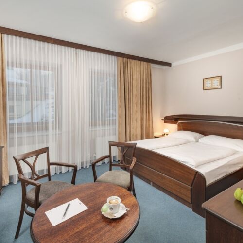 Komfort Pokoj s koupelnou s manželskou postelí (s možností přistýlky)