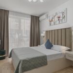 Apartament 6-osobowy Premia z balkonem z 3 pomieszczeniami sypialnianymi (możliwa dostawka)