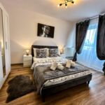 Apartament cu balcon cu vedere spre oraș cu 2 camere pentru 3 pers.