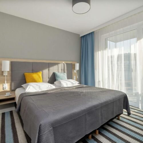 Apartament 8-osobowy z balkonem z 4 pomieszczeniami sypialnianymi