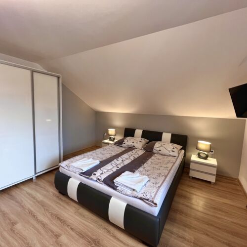 Pokój 4-osobowy na poddaszu z aneksem kuchennym