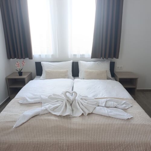 Se společnou kuchyňkou  Pokoj pro 2 os.