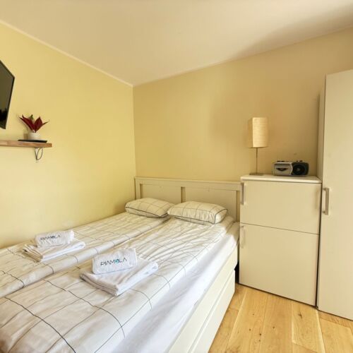 Pokoj s manželskou postelí přízemní 