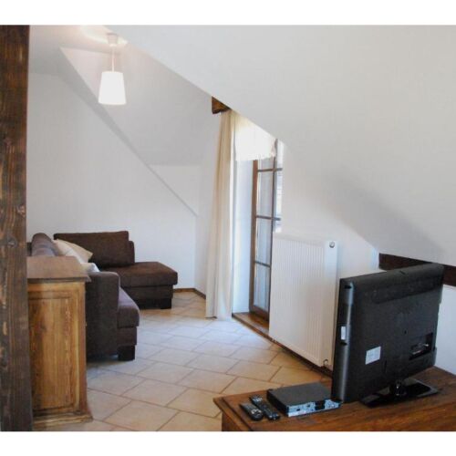 Apartament 2-osobowy na piętrze z widokiem na ogród z 1 pomieszczeniem sypialnianym (możliwa dostawka)