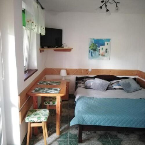 Apartament 4-osobowy na parterze z 2 pomieszczeniami sypialnianymi