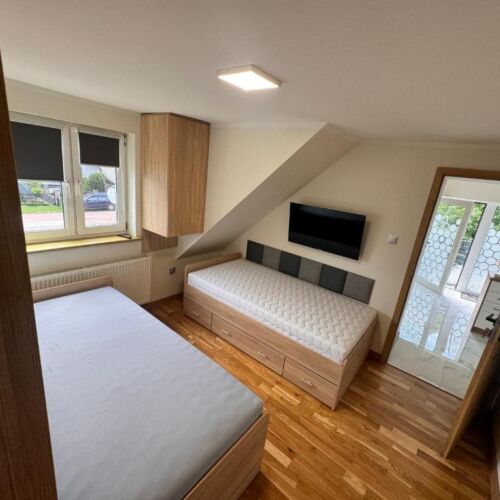 Apartament 9-osobowy z 3 pomieszczeniami sypialnianymi