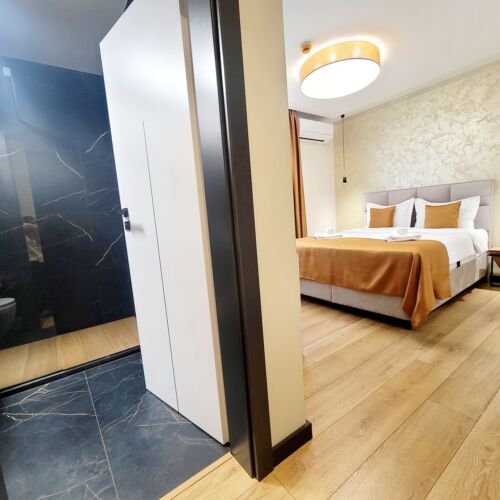 Rodinný Pokoj s manželskou postelí na přízemí