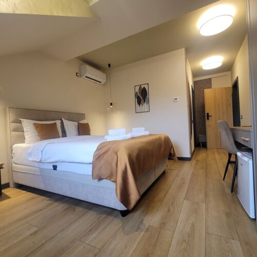 Rodinný Pokoj s manželskou postelí v podkroví