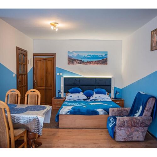 Apartament 4-osobowy z tarasem z 1 pomieszczeniem sypialnianym