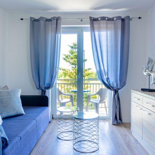 Apartament 4-osobowy z balkonem z aneksem kuchennym z 2 pomieszczeniami sypialnianymi