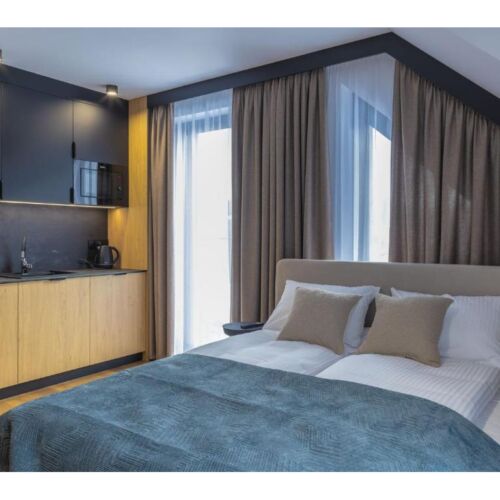 Apartament 2-osobowy z balkonem z 1 pomieszczeniem sypialnianym
