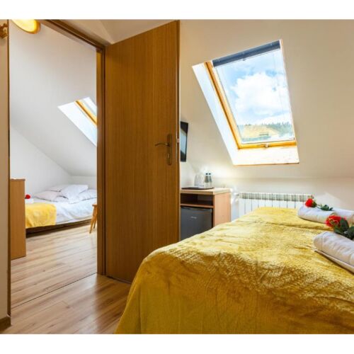 Apartament 4-osobowy na poddaszu Studio z 2 pomieszczeniami sypialnianymi