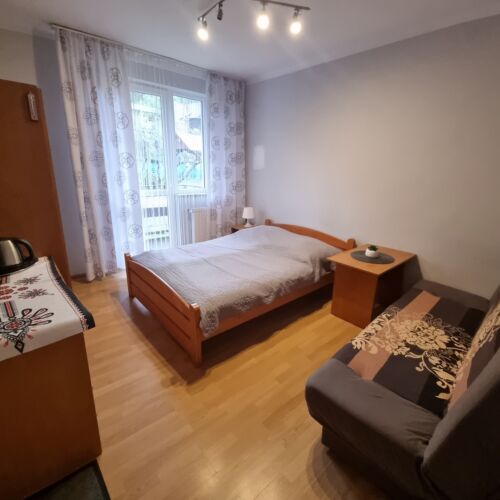 Pokoj pro 4 os. s výhledem do zahrady 